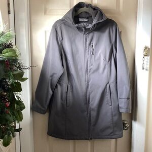 This is a all weather  jacket by Free Country in a light grey  XL